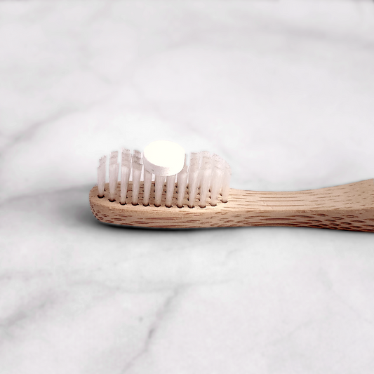 Unpaste Toothpaste Tablet on Toothbrush