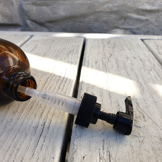 16 fl oz Amber Boston Round Bottle with Black Pump